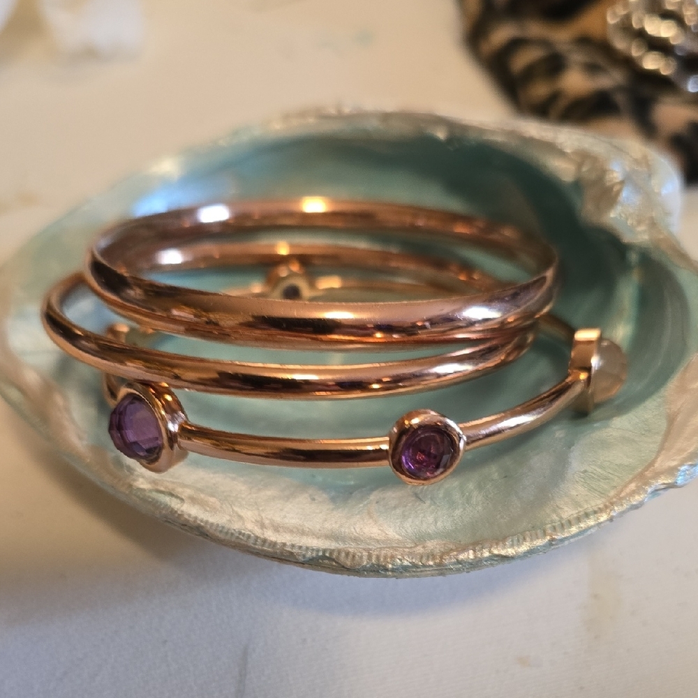 Elegant Gold Bangle Bracelet with Purple Accents